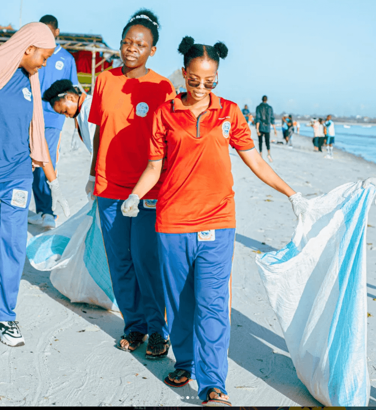 Ilakiza, founder of Think Green, at a beach cleanup